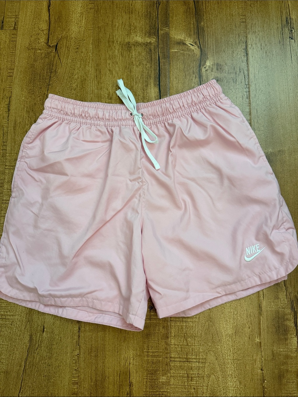 Nike Flow Shorts pink with white drawstring
